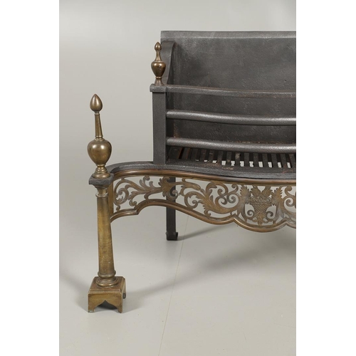 1215 - AN ADAMS STYLE CAST IRON AND BRASS FIRE BASKET. of serpentine form with wrought rear supports, pierc... 