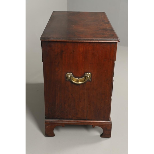 1216 - A GEORGE III MAHOGANY SECRETAIRE KNEEHOLE DESK. the moulded top above a secretaire section fitted wi... 