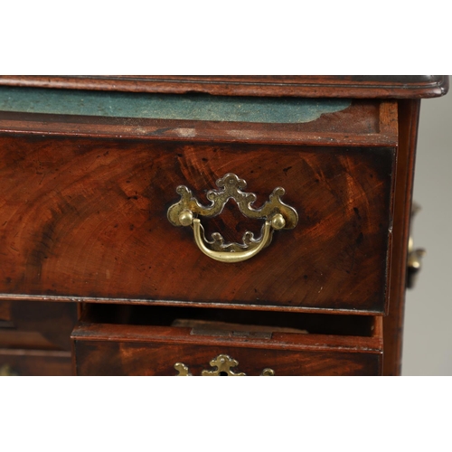 1216 - A GEORGE III MAHOGANY SECRETAIRE KNEEHOLE DESK. the moulded top above a secretaire section fitted wi... 