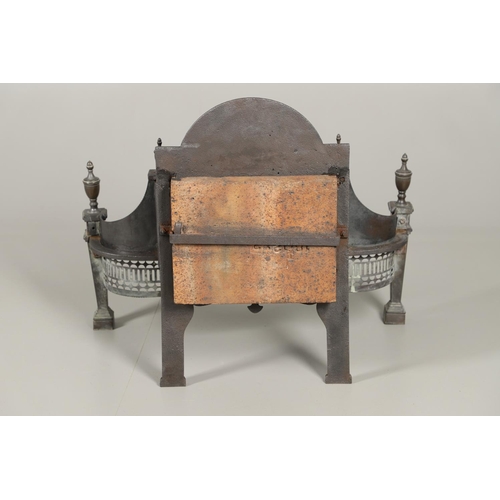 1217 - AN ADAMS STYLE CAST IRON FIRE BASKET. of serpentine form with pierced copper front, tapering square ... 