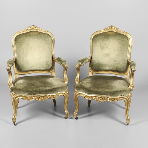 1219 - A PAIR OF 19TH CENTURY LOUIS XV STYLE GILTWOOD FAUTEUILS A LA REINES. each with a carved show frame ... 