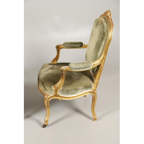 1219 - A PAIR OF 19TH CENTURY LOUIS XV STYLE GILTWOOD FAUTEUILS A LA REINES. each with a carved show frame ... 