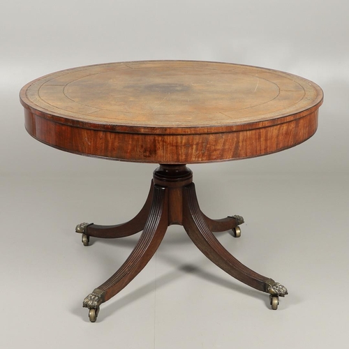 1221 - A REGENCY MAHOGANY CIRCULAR LIBRARY TABLE. the top with tooled leather insert, on a turned column an... 