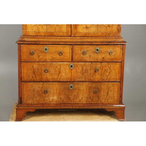 1222 - A GEORGE II WALNUT CABINET ON CHEST. the cabinet with moulded cornice above eleven fitted drawers to... 