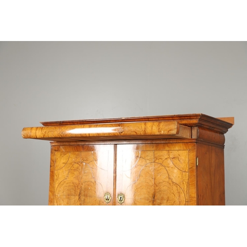 1222 - A GEORGE II WALNUT CABINET ON CHEST. the cabinet with moulded cornice above eleven fitted drawers to... 