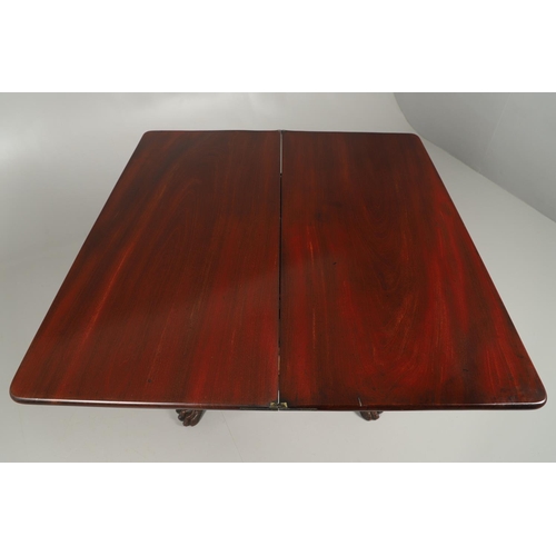 1223 - A WILLIAM IV MAHOGANY TEA TABLE. the fold over rectangular top over a recessed panel flanked by carv... 