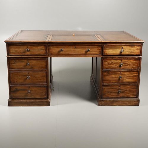 1227 - A 19TH CENTURY MAHOGANY PARTNERS DESK. the tooled and segmented leather top with central writing slo... 