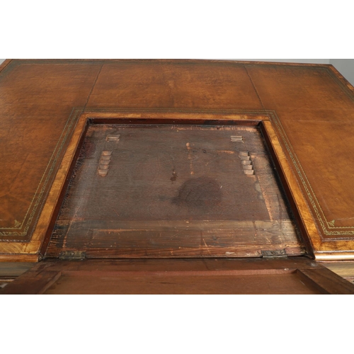 1227 - A 19TH CENTURY MAHOGANY PARTNERS DESK. the tooled and segmented leather top with central writing slo... 