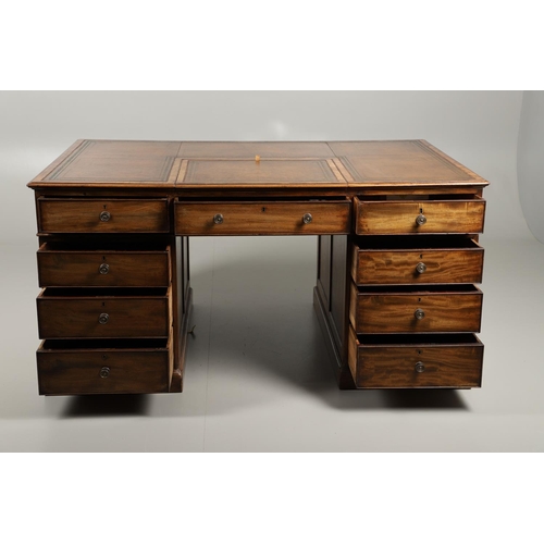 1227 - A 19TH CENTURY MAHOGANY PARTNERS DESK. the tooled and segmented leather top with central writing slo... 