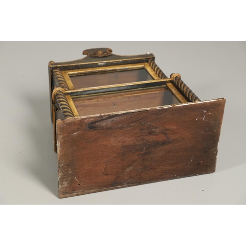 1229 - A VICTORIAN EBONISED AND GILDED CURIO TABLE CABINET. the tray top with ball finials and moulded figu... 