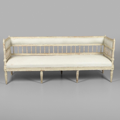 1230 - A SWEDISH LOUIS XVI STYLE PAINTED PINE SALON SOFA.with padded and leaf carved spindle back, flower r... 