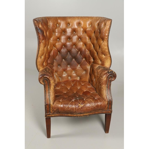 1233 - A GEORGE III STYLE LEATHER WINGBACK ARMCHAIR. with high back, serpentine seat and scroll arms, the b... 