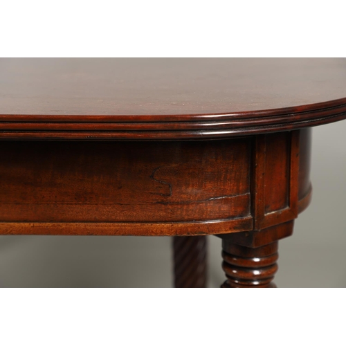 1238 - A REGENCY MAHOGANY EXTENDING DINING TABLE. the rectangular top with a reeded edge and concertina act... 