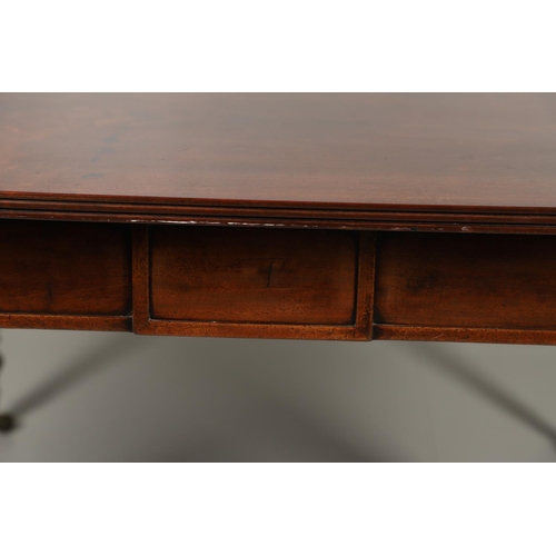 1238 - A REGENCY MAHOGANY EXTENDING DINING TABLE. the rectangular top with a reeded edge and concertina act... 