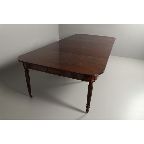 1238 - A REGENCY MAHOGANY EXTENDING DINING TABLE. the rectangular top with a reeded edge and concertina act... 