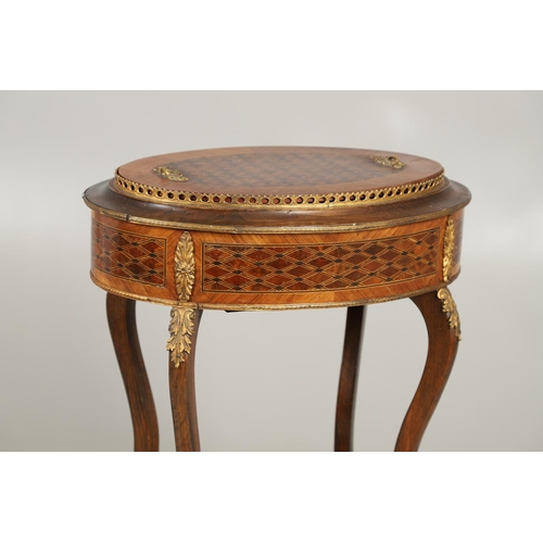 1239 - A NAPOLEON III OVAL PARQUETRY JARDINIERE AND COVER. the top with pierced brass gallery, gilt metal f... 