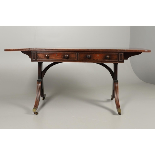 1242 - A REGENCY MAHOGANY AND ROSEWOOD BANDED SOFA TABLE IN THE MANNER OF GILLOWS. the rosewood banded and ... 