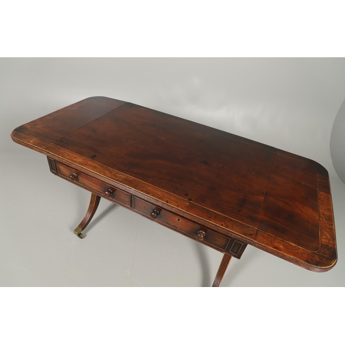 1242 - A REGENCY MAHOGANY AND ROSEWOOD BANDED SOFA TABLE IN THE MANNER OF GILLOWS. the rosewood banded and ... 