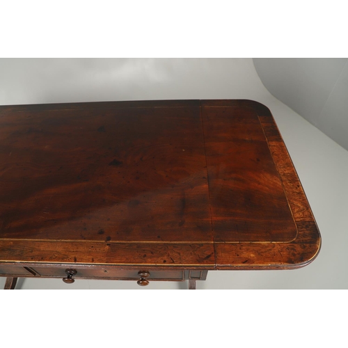 1242 - A REGENCY MAHOGANY AND ROSEWOOD BANDED SOFA TABLE IN THE MANNER OF GILLOWS. the rosewood banded and ... 