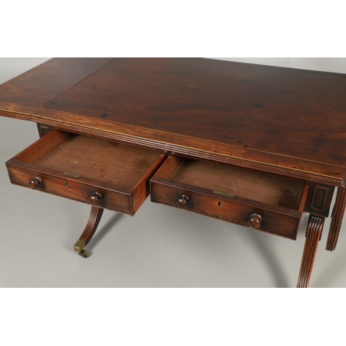 1242 - A REGENCY MAHOGANY AND ROSEWOOD BANDED SOFA TABLE IN THE MANNER OF GILLOWS. the rosewood banded and ... 