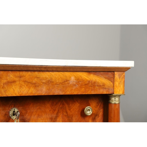 1245 - A 19TH CENTURY EMPIRE STYLE MAHOGANY COMMODE. with a light grey marble top over four long drawers, f... 