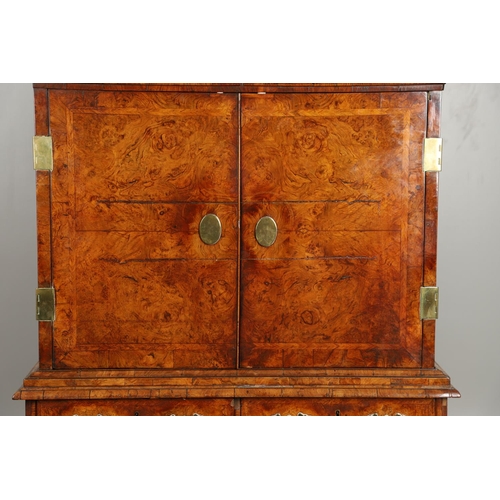 1251 - AN EARLY 18TH CENTURY WALNUT ESTATE CUPBOARD. the cushion cornice with unusual hinged lockable front... 