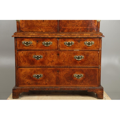 1251 - AN EARLY 18TH CENTURY WALNUT ESTATE CUPBOARD. the cushion cornice with unusual hinged lockable front... 