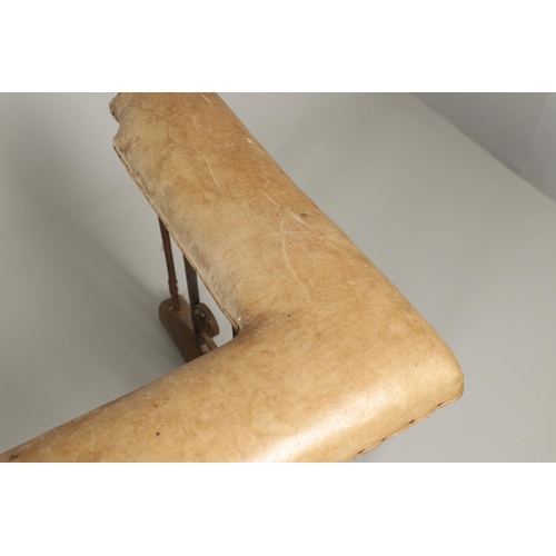 1252 - A 19TH CENTURY LEATHER AND WROUGHT IRON CLUB FENDER. the pale green leather seat over an ornate wrou... 