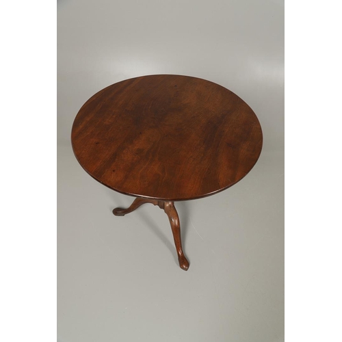 1254 - A GEORGE III MAHOGANY TRIPOD TABLE. the circular top with tilt top action upon a birdcage support, t... 