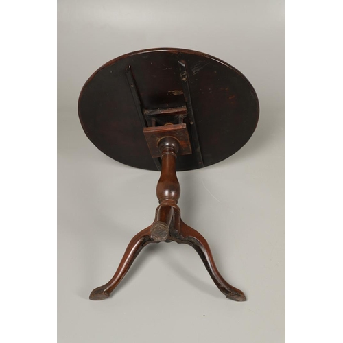 1254 - A GEORGE III MAHOGANY TRIPOD TABLE. the circular top with tilt top action upon a birdcage support, t... 