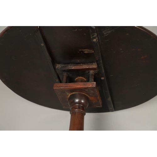 1254 - A GEORGE III MAHOGANY TRIPOD TABLE. the circular top with tilt top action upon a birdcage support, t... 