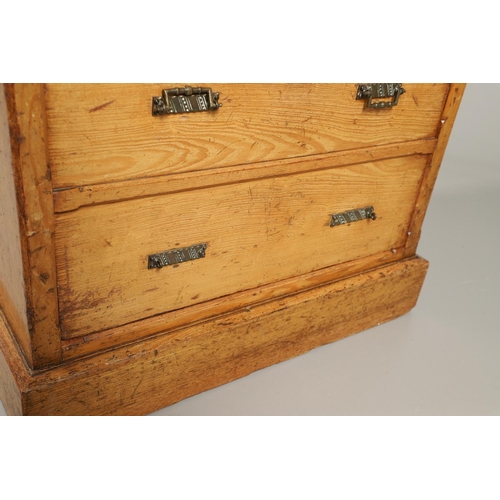 1255 - A LATE VICTORIAN OAK WELLINGTON STYLE CHEST OF DRAWERS. the hinged top opening to reveal sectional s... 