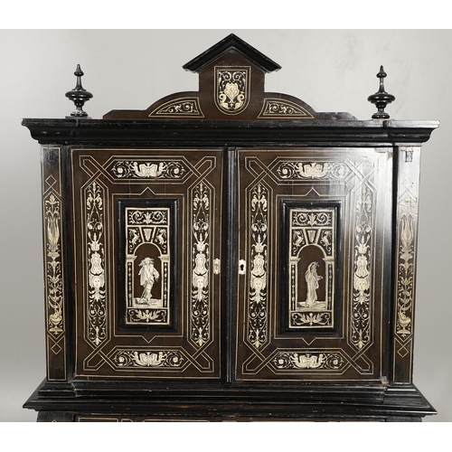 1258 - A NORTH ITALIAN IVORY INLAID EBONISED CABINET. late 19th century, with decorative Classical motif an... 