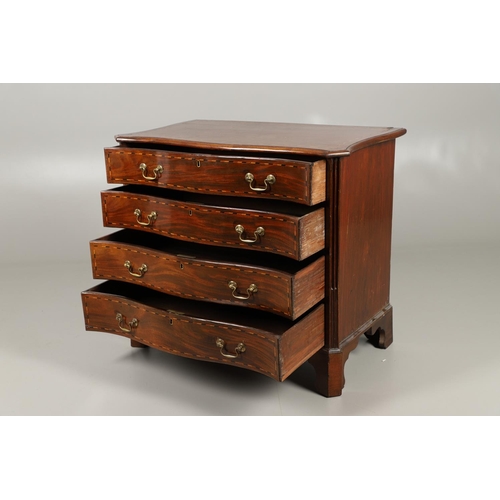 1259 - A GEORGE III INLAID MAHOGANY SERPENTINE CHEST OF DRAWERS. with four graduated drawers and recurring ... 