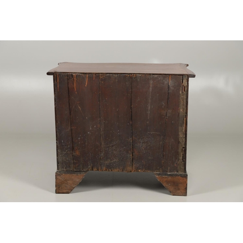 1259 - A GEORGE III INLAID MAHOGANY SERPENTINE CHEST OF DRAWERS. with four graduated drawers and recurring ... 