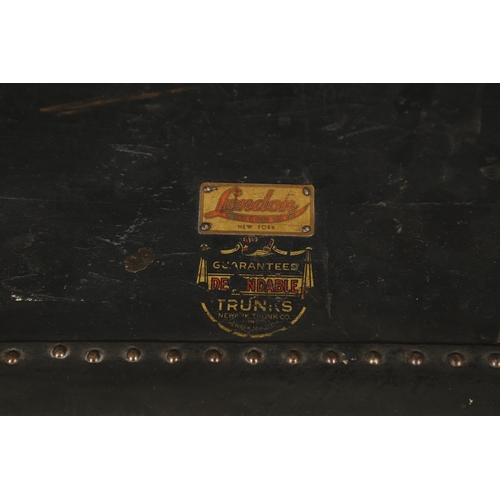 1263 - AN EARLY 20TH CENTURY BRASS BOUND LEATHER STEAMER TRUNK. with retailer's label for Trunk & Bag Co Lo... 