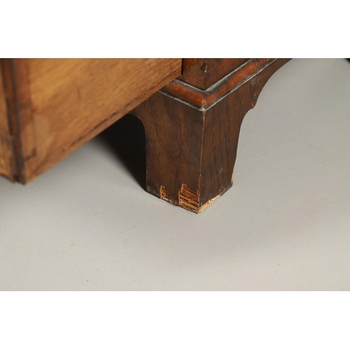 1264 - AN 18TH CENTURY WALNUT BUREAU. of small proportions with feathered crossbanding, the fall front encl... 