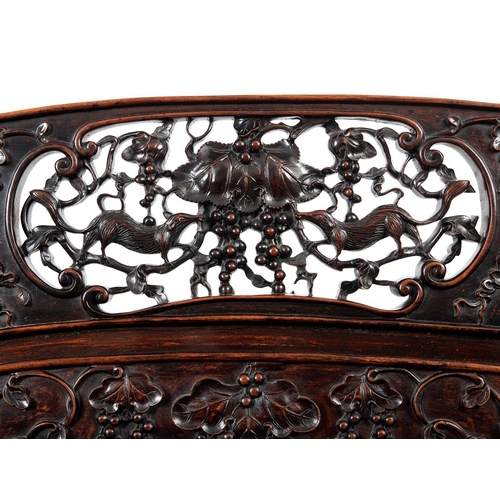 1267 - A CHINESE CARVED HARDWOOD HALL SEAT, QING DYNASTY, 19TH CENTURY. the shaped back with pierced triple... 