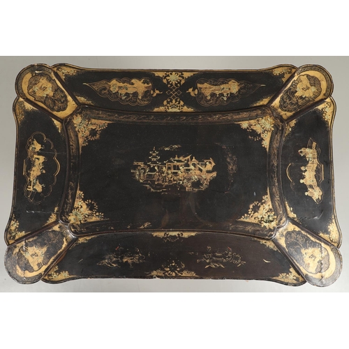 1269 - A CHINESE EXPORT LACQUERED WORK TABLE. the shaped lid with gilt Chinoiserie decoration of figures in... 