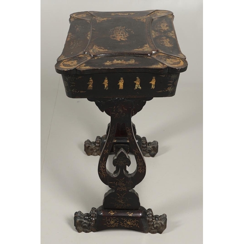 1269 - A CHINESE EXPORT LACQUERED WORK TABLE. the shaped lid with gilt Chinoiserie decoration of figures in... 