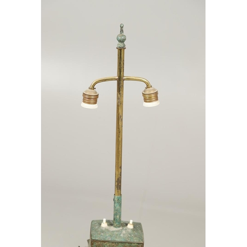 1271 - A PAIR OF CHINESE STYLE ARCHAIC BRONZE TABLE LAMPS. 20th century, with green painted 'patinated' fin... 