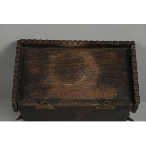 1273 - AN INDIAN CARVED HARDWOOD WALL SHELF. the ornately carved rectangular shelf on a peacock support wit... 