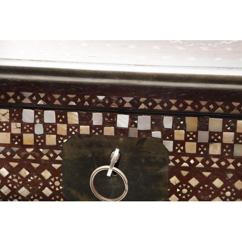 1275 - A MIDDLE EASTERN MOTHER OF PEARL INLAID HARDWOOD BOX. early 20th century, the hinged lid enclosing a... 