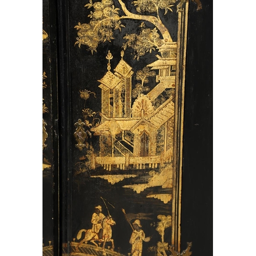 1276 - AN EARLY 20TH CENTURY BLACK CHINOISERIE HANGING CORNER CUPBOARD. the bow front doors gilt decorated ... 