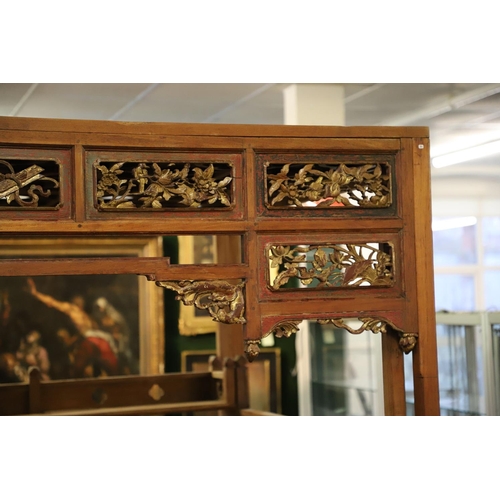 1277 - AN EARLY 20TH CENTURY MEDAN/CHINESE TEAK OPIUM CANOPY BED. the canopy front with seven carved and pi... 