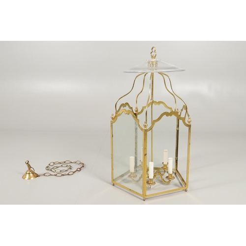 1280 - A 19TH CENTURY FRENCH BRASS HALL LANTERN. with five scroll shaped panels enclosing a central light f... 