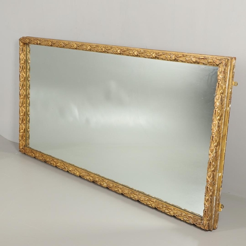 1284 - A SUBSTANTIAL LATE VICTORIAN GILT AND GESSO FRAMED WALL MIRROR. the pine frame with oak leaf and aco... 