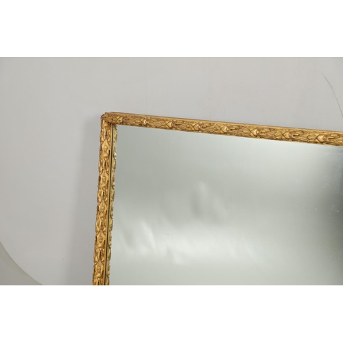 1284 - A SUBSTANTIAL LATE VICTORIAN GILT AND GESSO FRAMED WALL MIRROR. the pine frame with oak leaf and aco... 