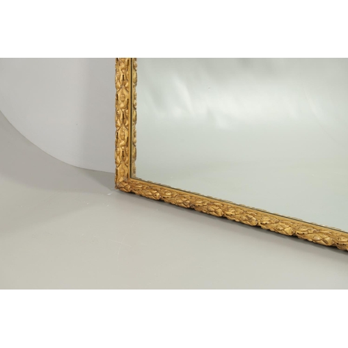 1284 - A SUBSTANTIAL LATE VICTORIAN GILT AND GESSO FRAMED WALL MIRROR. the pine frame with oak leaf and aco... 