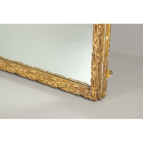 1284 - A SUBSTANTIAL LATE VICTORIAN GILT AND GESSO FRAMED WALL MIRROR. the pine frame with oak leaf and aco... 